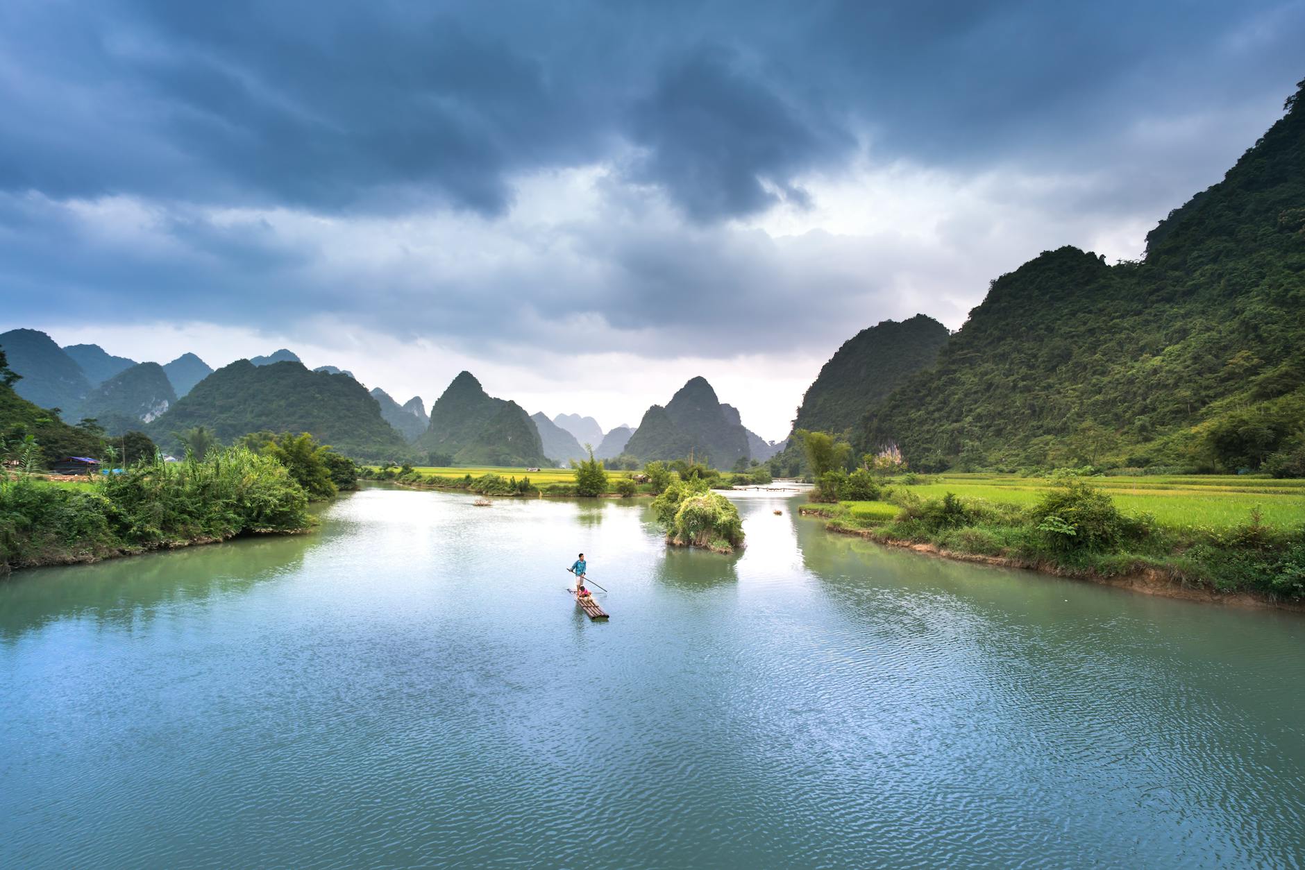 man on boat in lake